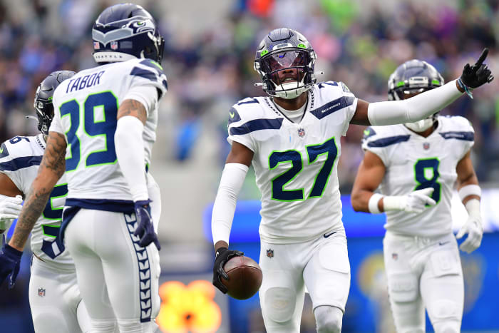 Named a Pro Bowler as a rookie, Tariq Woolen led all cornerbacks with six interceptions in 17 starts.
